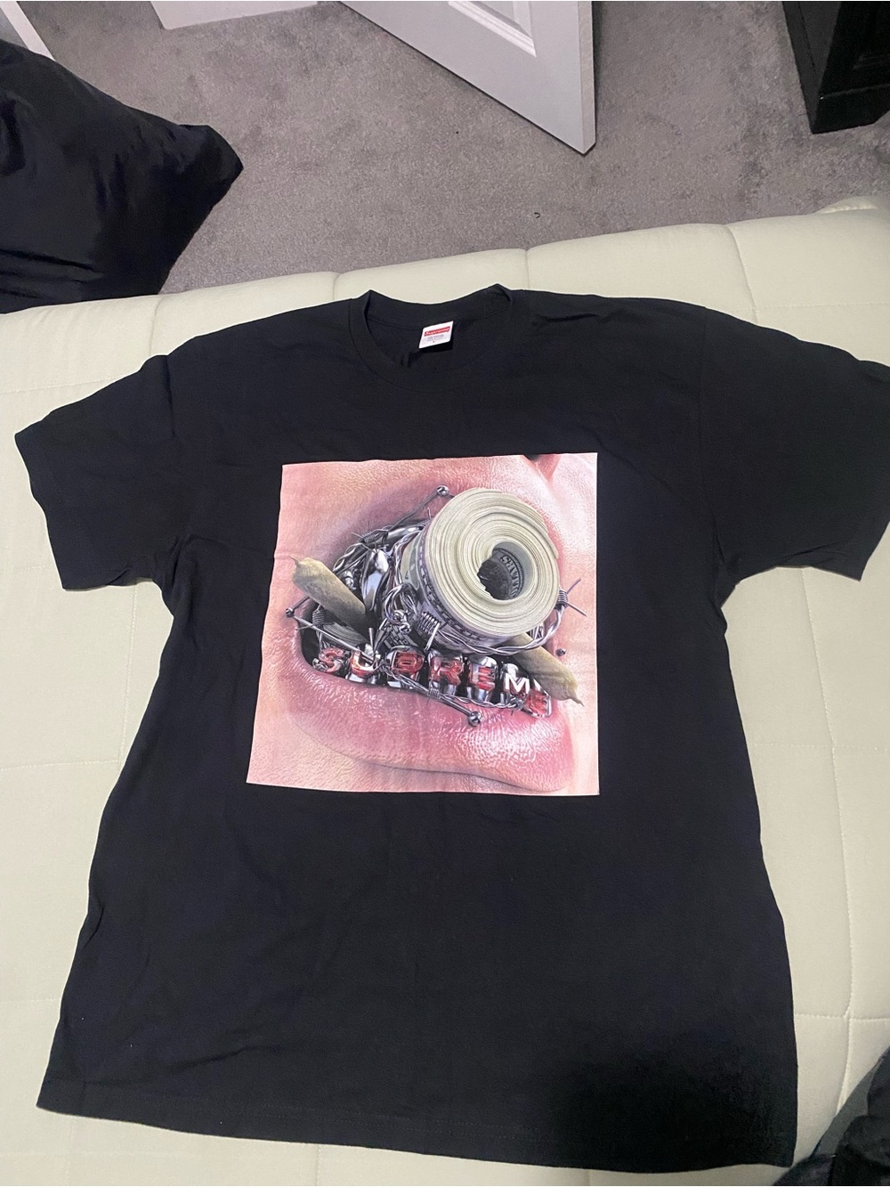 Supreme Black T-Shirt with Red Logo Tag